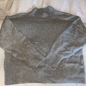 Grey turtleneck sweater